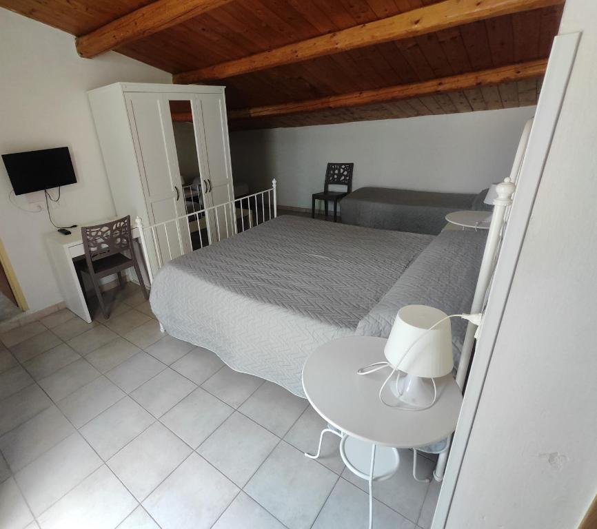 Postel nebo postele na pokoji v ubytování B&B Del Carmine