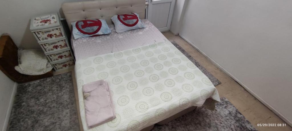 Postel nebo postele na pokoji v ubytování Şarköy Günlük Kiralık Ev