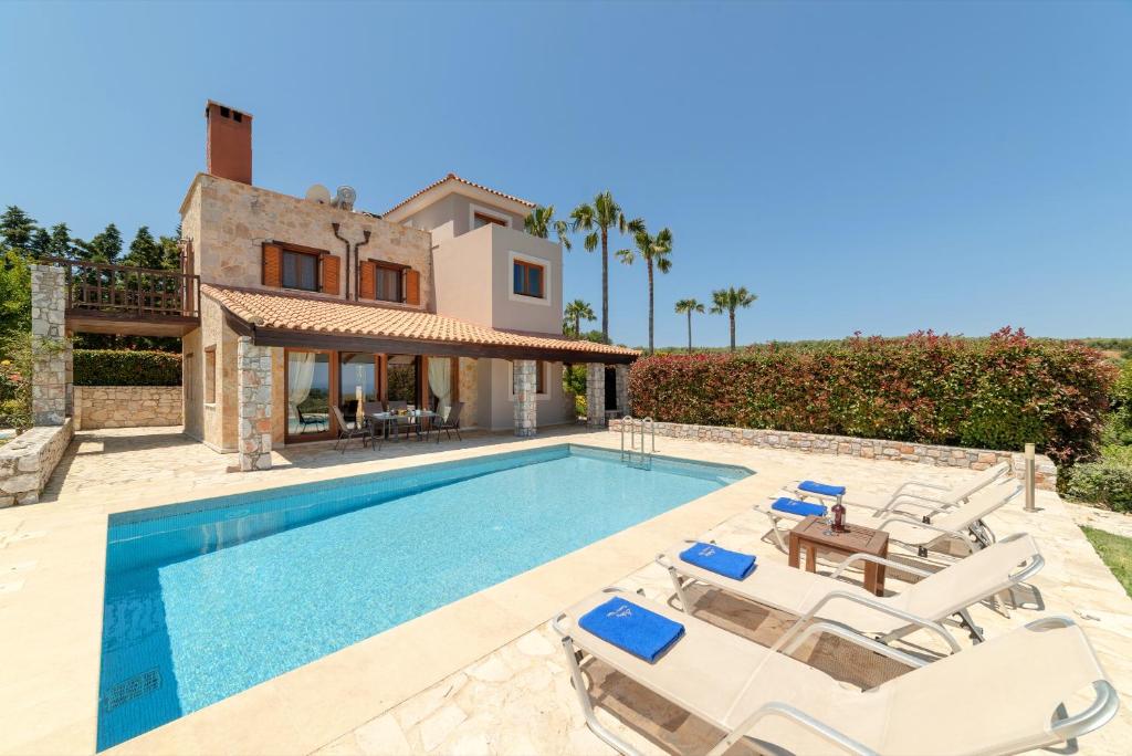 an image of a villa with a swimming pool at Villa Rodia by PosarelliVillas in Kipárissos