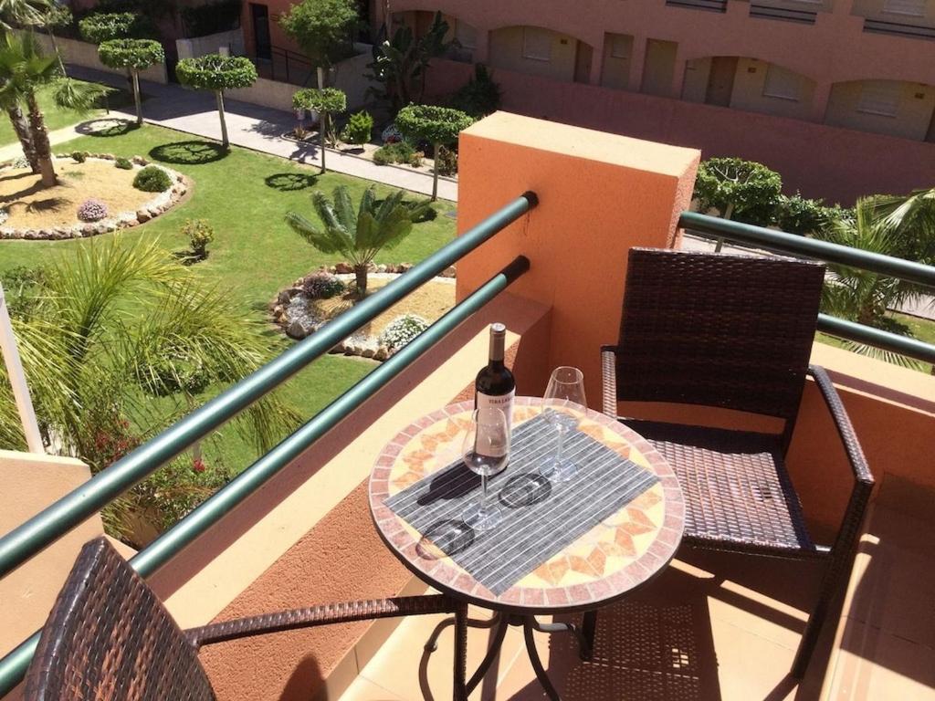 Balkón alebo terasa v ubytovaní Homes of Spain, Apartamentos Paraíso, Ed Palmerston, Atico B a pie de Playa, piscina privada en solárium, WI-FI
