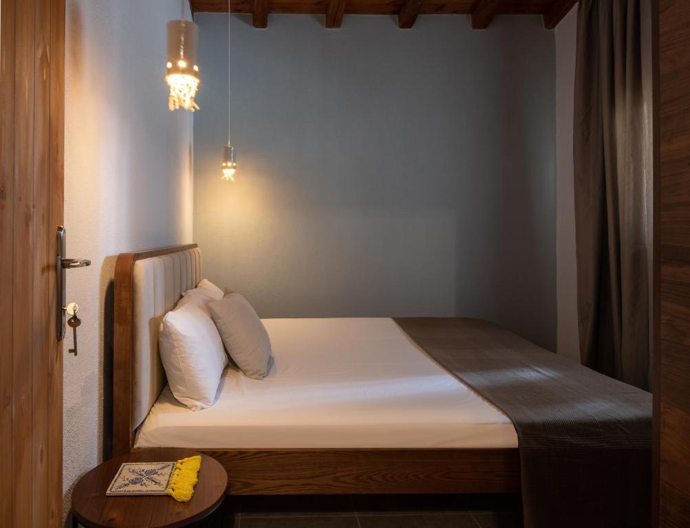 Postel nebo postele na pokoji v ubytování Amaryllis apartments