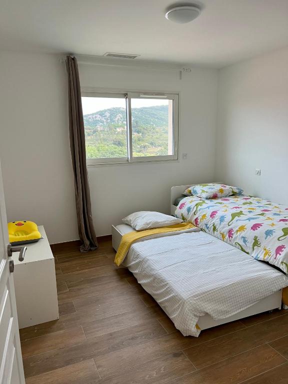 Posteľ alebo postele v izbe v ubytovaní Chambres & Suites Villa architecte