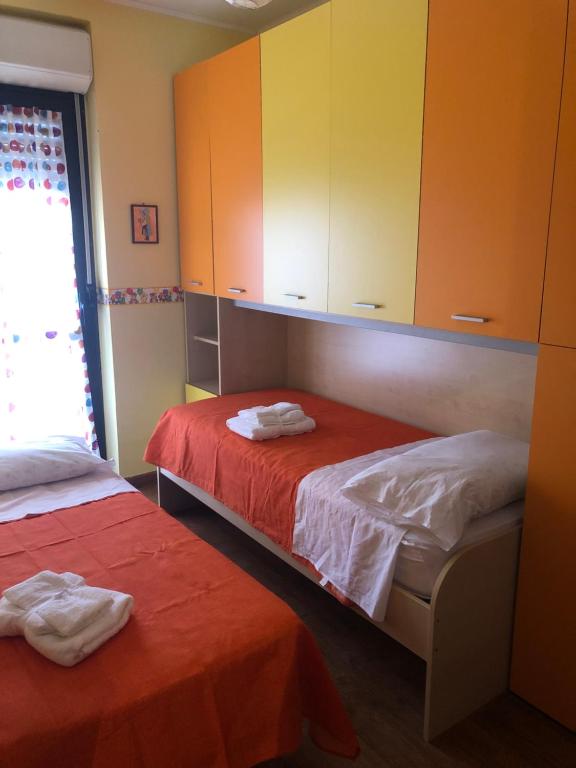Postel nebo postele na pokoji v ubytování Casa di Taty - Home resort