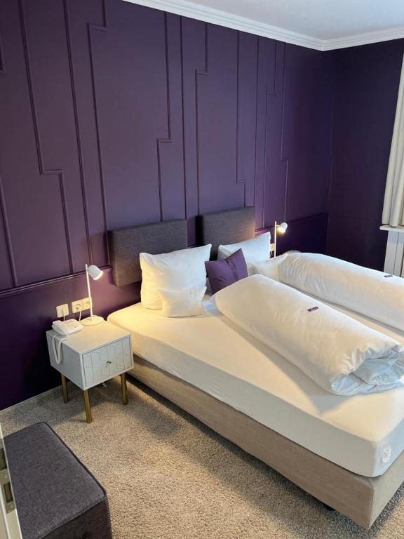 Postel nebo postele na pokoji v ubytování Hotel Schwarzwaldhof