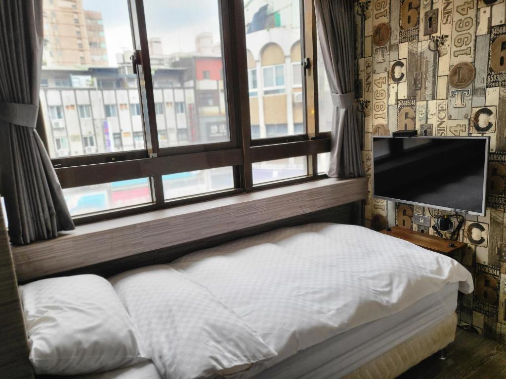 Postel nebo postele na pokoji v ubytování The Cole Hotel