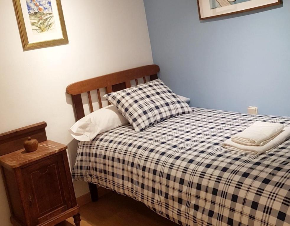 Postel nebo postele na pokoji v ubytování EVA & TRAVEL - Cal Manco