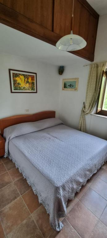 Posteľ alebo postele v izbe v ubytovaní Casavacanza al castello 2