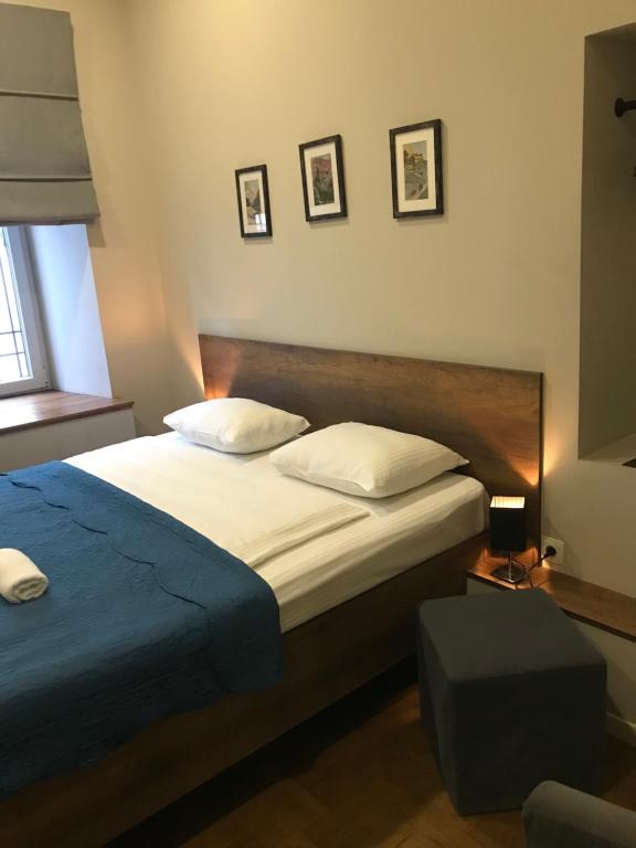 Postel nebo postele na pokoji v ubytování Hotel Loft