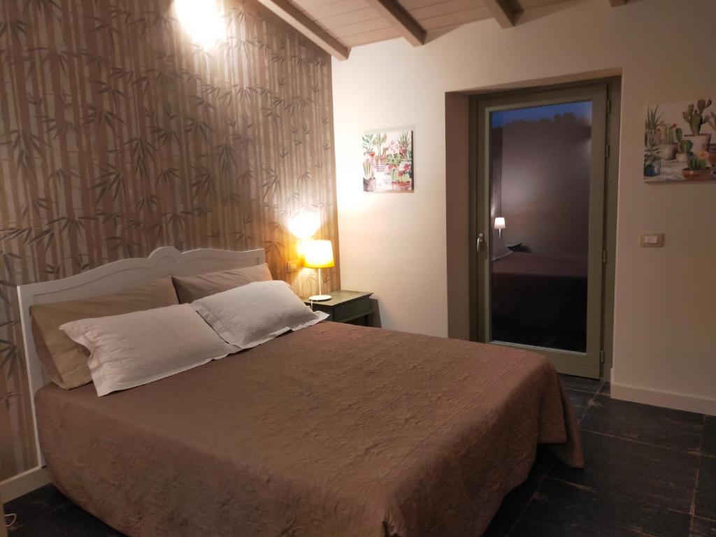 Posteľ alebo postele v izbe v ubytovaní Casa Zeli