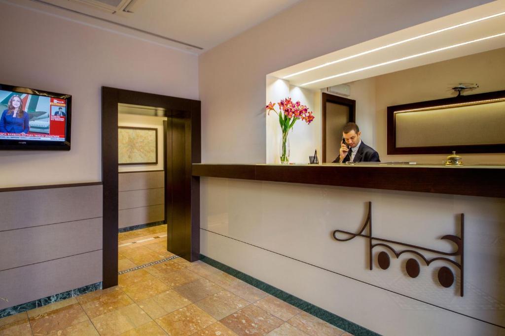 TV a/nebo společenská místnost v ubytování Hotel Dei Mille