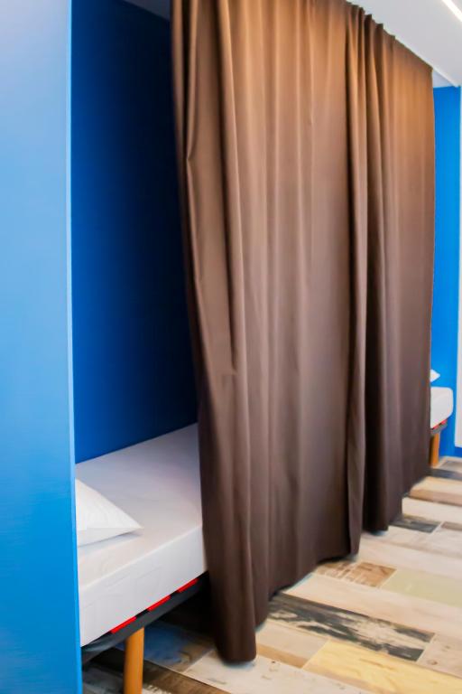 Posteľ alebo postele v izbe v ubytovaní Albergue playa de sabaris