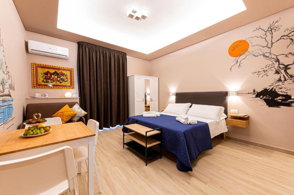 Posteľ alebo postele v izbe v ubytovaní ASTARE -short lets in bari carrassi-