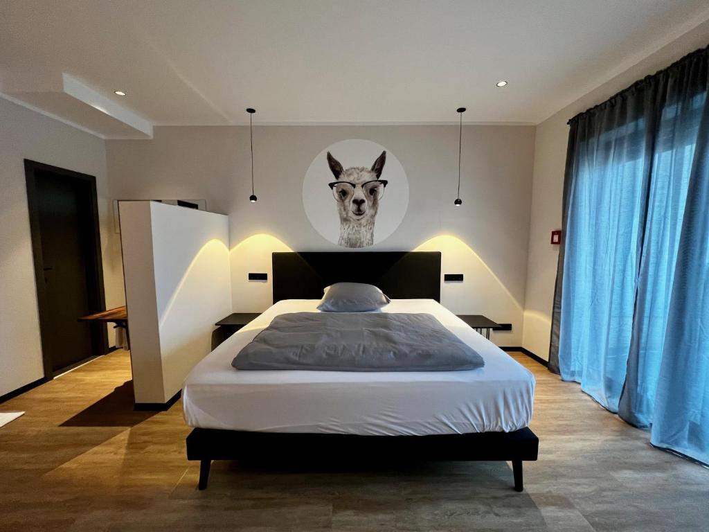 Postel nebo postele na pokoji v ubytování Hotel Drei Höfe