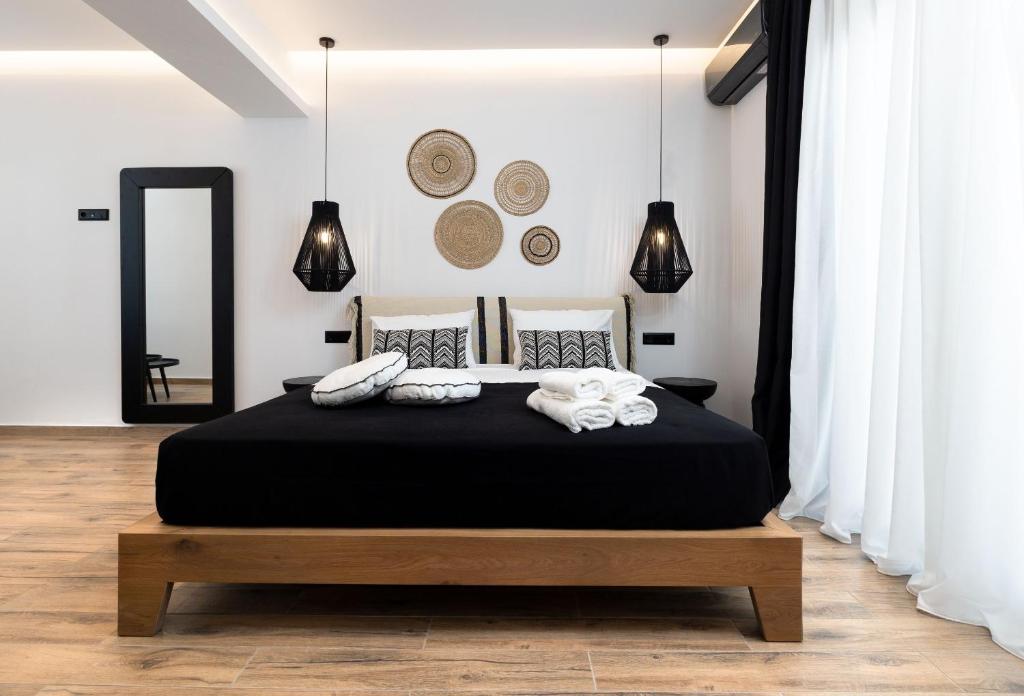 Posteľ alebo postele v izbe v ubytovaní Naxian Memories Apartments