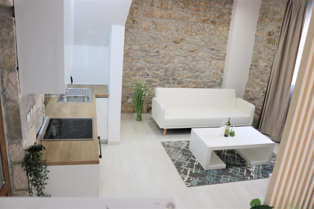 Kuchyň nebo kuchyňský kout v ubytování City Center Chic Apartments