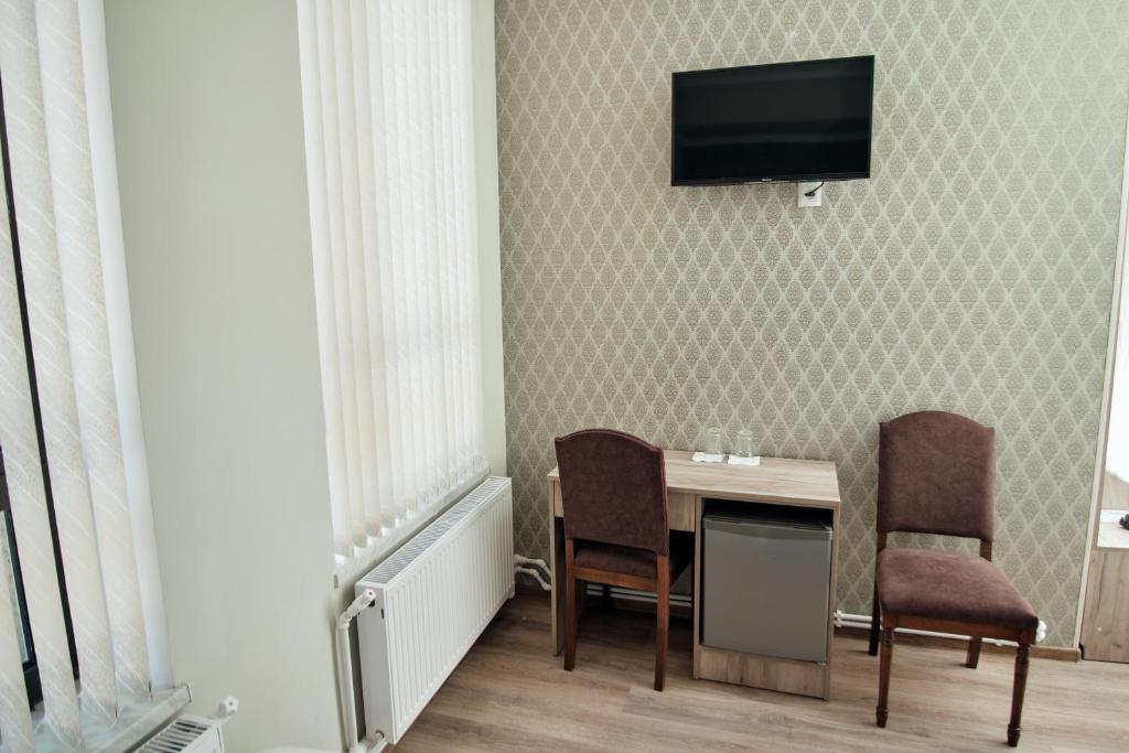 TV a/nebo společenská místnost v ubytování RO METRO