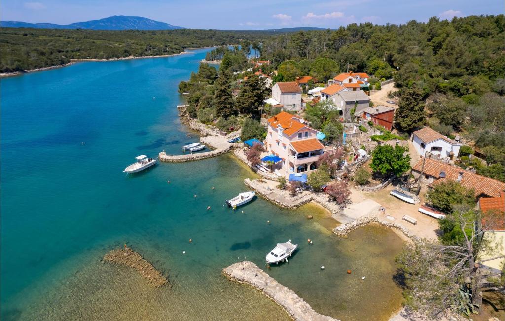an aerial view of a small island in the water at 2 Bedroom Lovely Apartment In Punta Kriza in Punta Križa