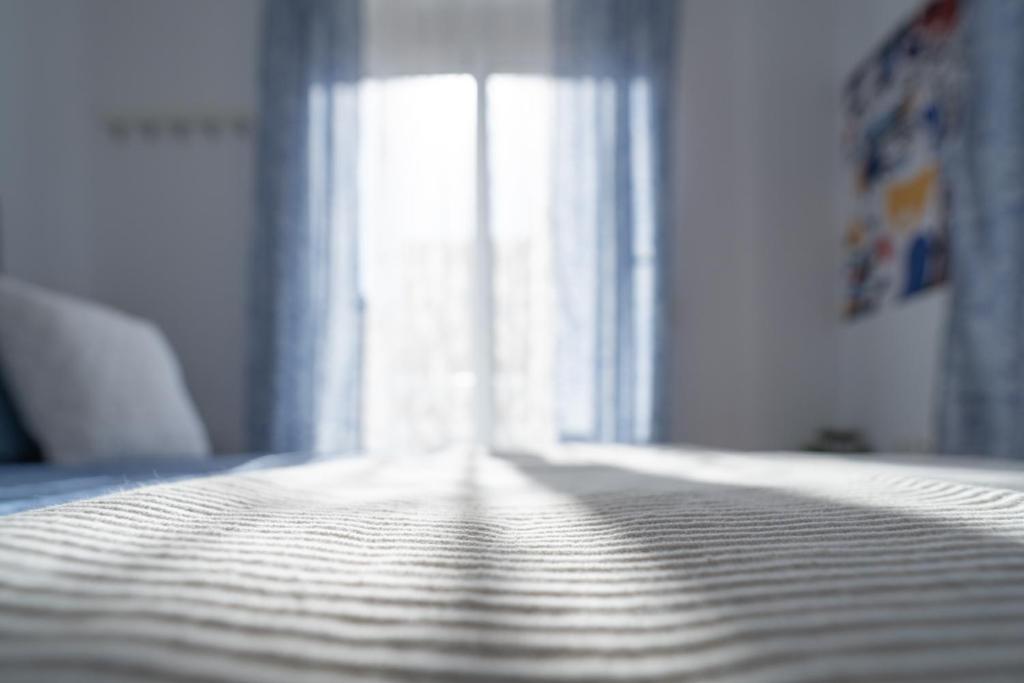 Posteľ alebo postele v izbe v ubytovaní Origeo casa