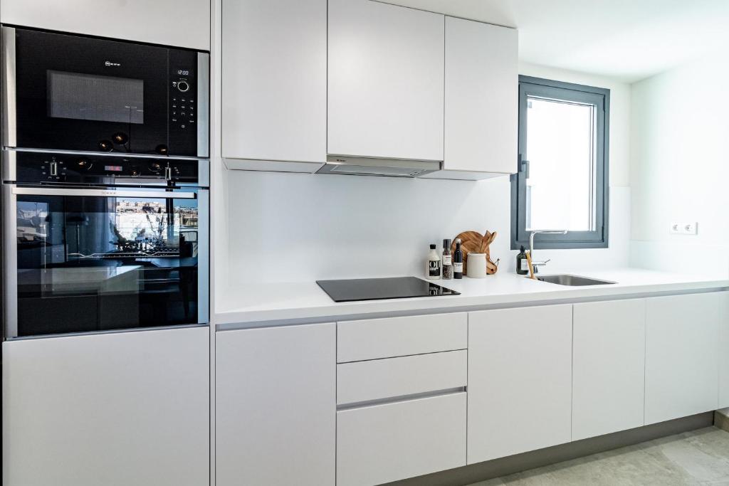 Kuchyň nebo kuchyňský kout v ubytování INF32L- Modern city apartment, families only