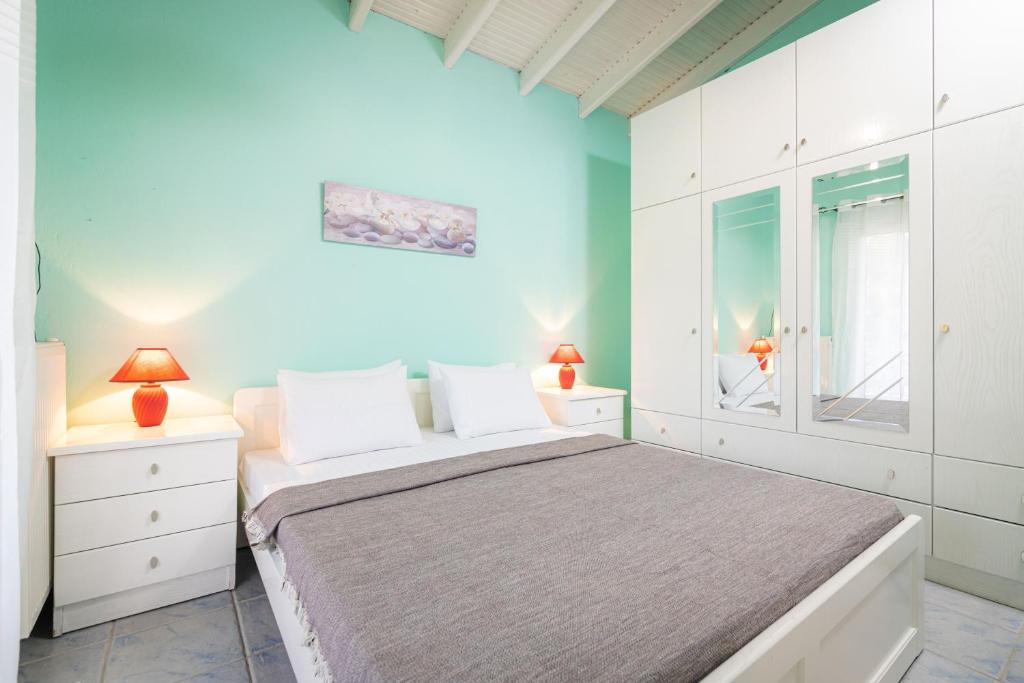 Postel nebo postele na pokoji v ubytování F & B Summer Collection - Paliouri