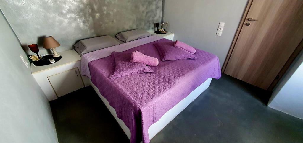 Postel nebo postele na pokoji v ubytování Heraklion Gortyn Phaistos House