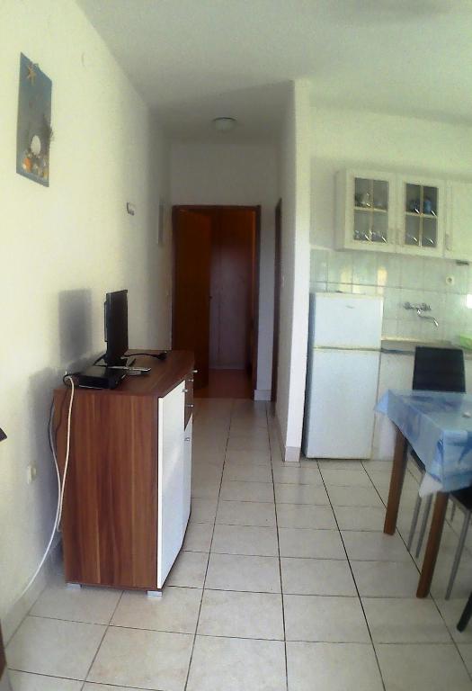 Kuchyň nebo kuchyňský kout v ubytování Apartmani Mediteran Copic