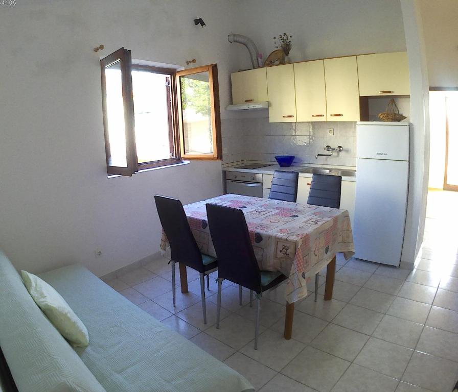 Kuchyň nebo kuchyňský kout v ubytování Apartmani Mediteran Copic