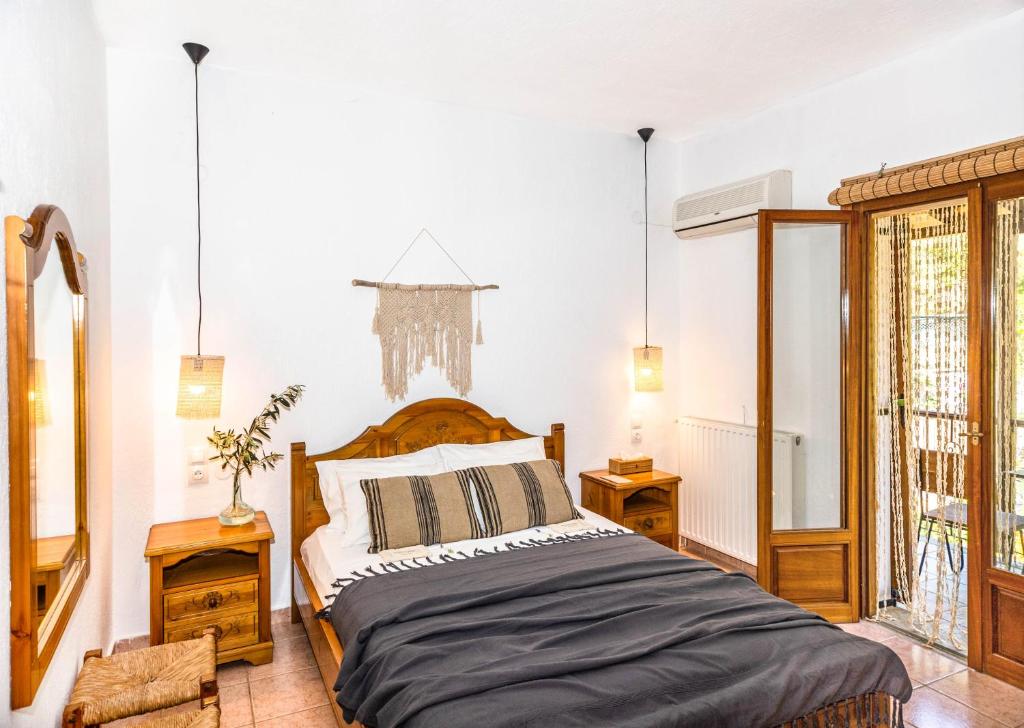 A bed or beds in a room at Casa Gaia