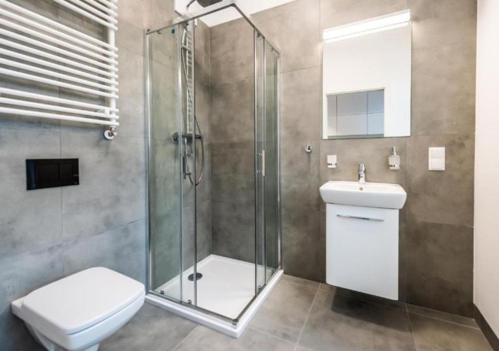 Kúpeľňa v ubytovaní Apartamenty Do Studzienki 65