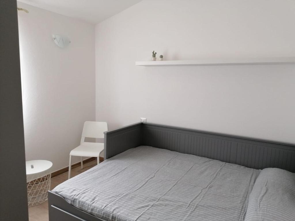 Postel nebo postele na pokoji v ubytování La Casa di su