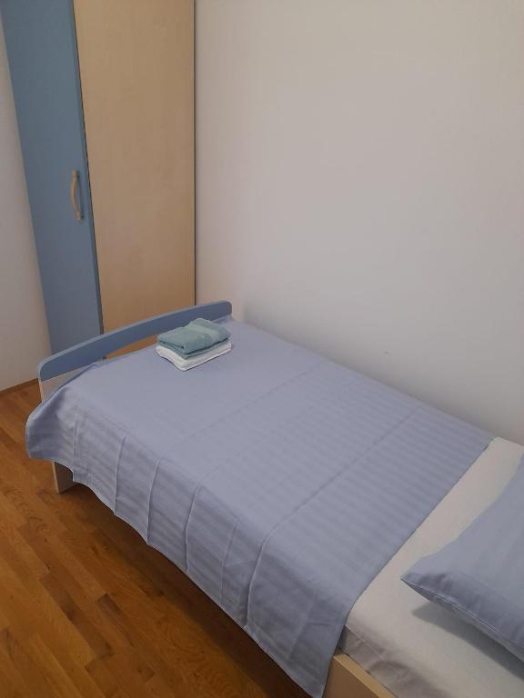 Posteľ alebo postele v izbe v ubytovaní Kike apartment