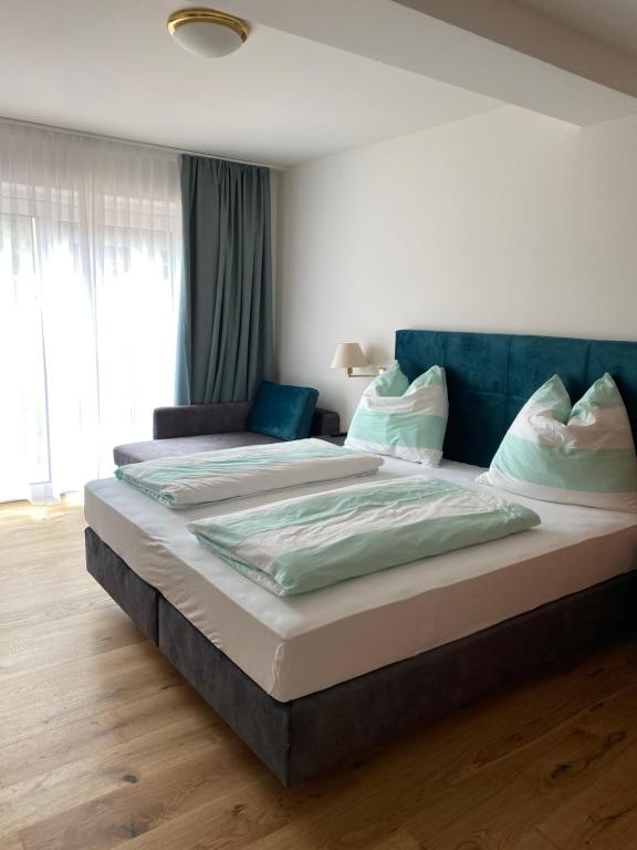 Katil atau katil-katil dalam bilik di Stockers kleines Dorfhotel