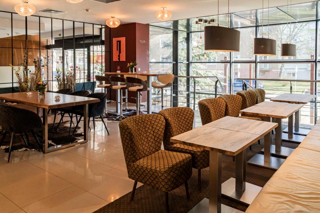 Posedenie v ubytovaní IMPIQ Hotel