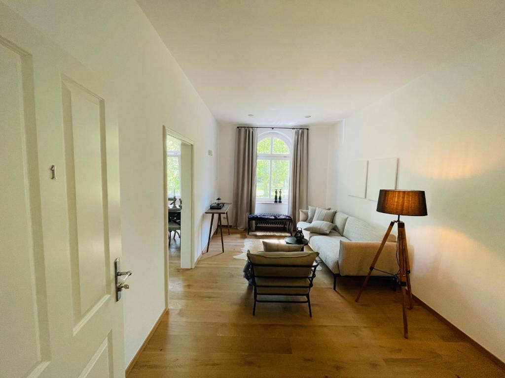 Postel nebo postele na pokoji v ubytování Kaiserliche Post Suites Bevensen-Ferienwohnung