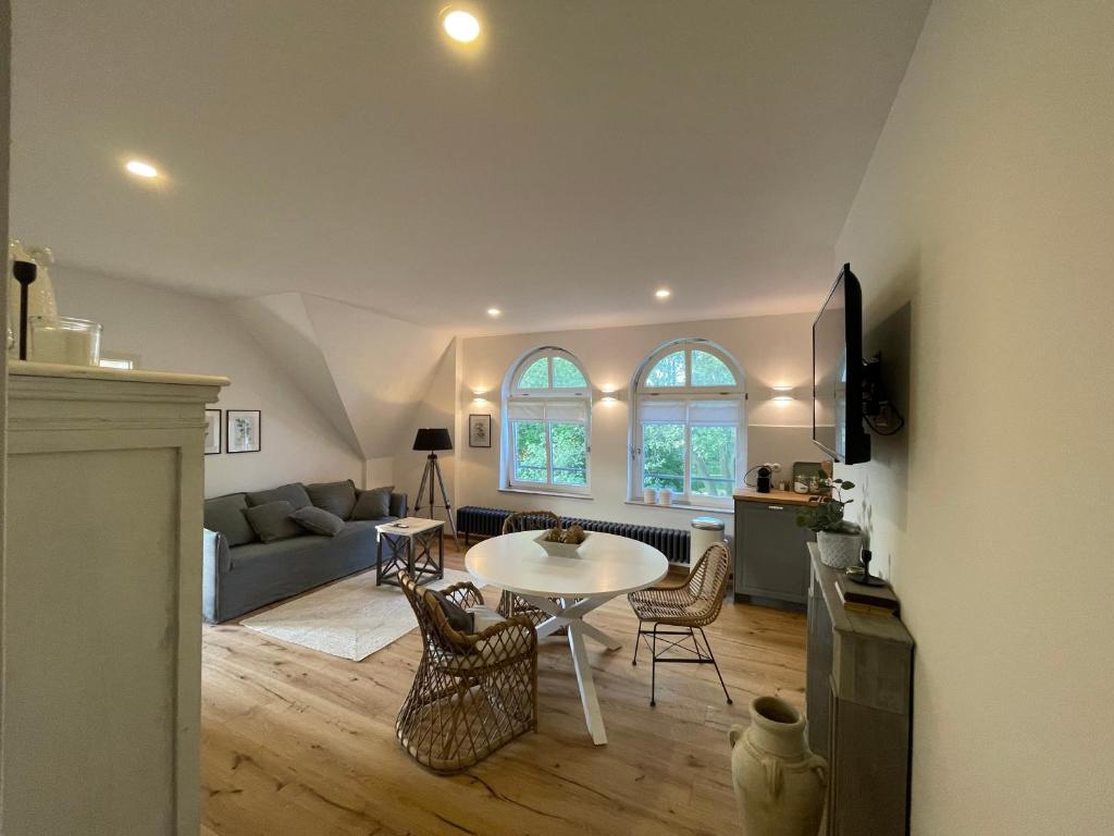 Posezení v ubytování Kaiserliche Post Suites Bevensen-Ferienwohnung