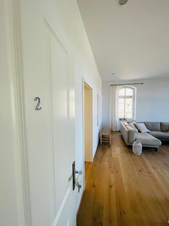 Postel nebo postele na pokoji v ubytování Kaiserliche Post Suites Bevensen-Ferienwohnung