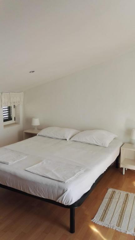 Posteľ alebo postele v izbe v ubytovaní Apartment Dalma