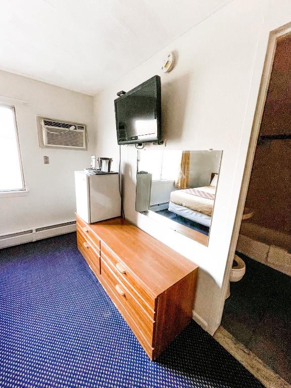 Kuchyň nebo kuchyňský kout v ubytování Utica Rest Inn