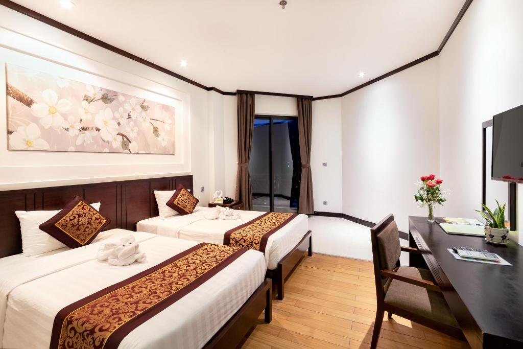 Postel nebo postele na pokoji v ubytování Con Dao Resort