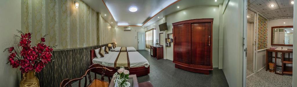 two pictures of a hospital room with a bed at Dong Bao Hotel in Chau Doc