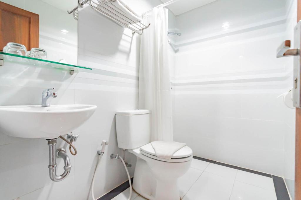 Urbanview Hotel Syariah Dapen Pontianak by RedDoorz - Économie Double Pièce