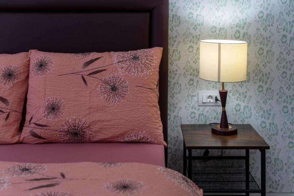 Postel nebo postele na pokoji v ubytování Hostel Antique