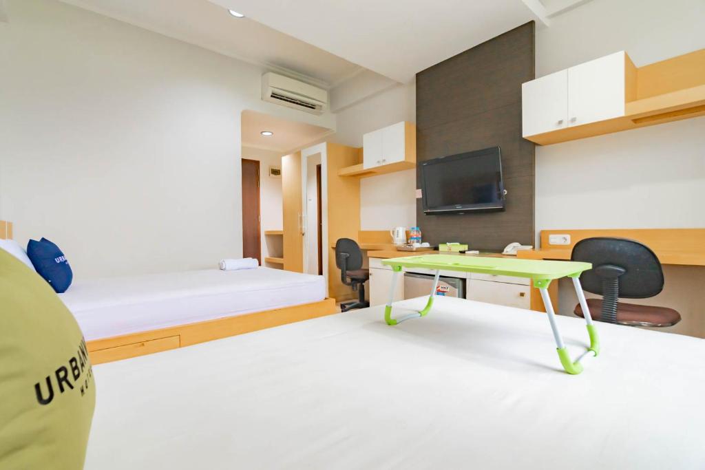 Urbanview Hotel Syariah Dapen Pontianak by RedDoorz - Salle Jumelle Supérieure