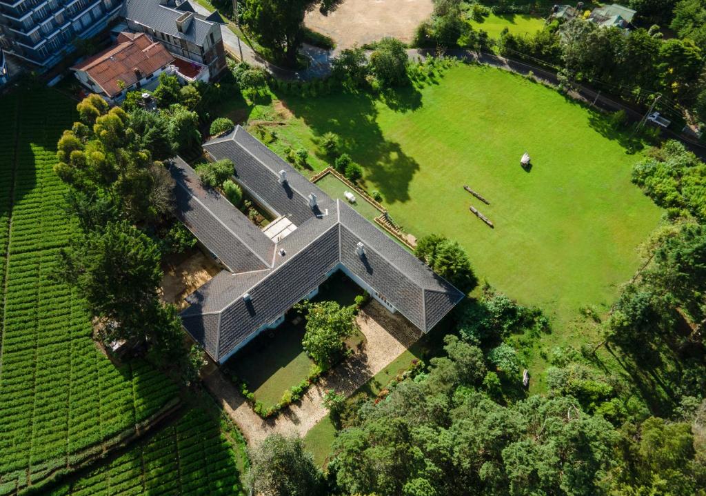 an overhead view of a large house with a yard at Broomfield by Jetwing in Nuwara Eliya