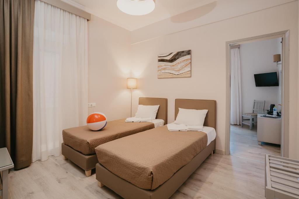 TV a/nebo společenská místnost v ubytování Hotel Alkyon