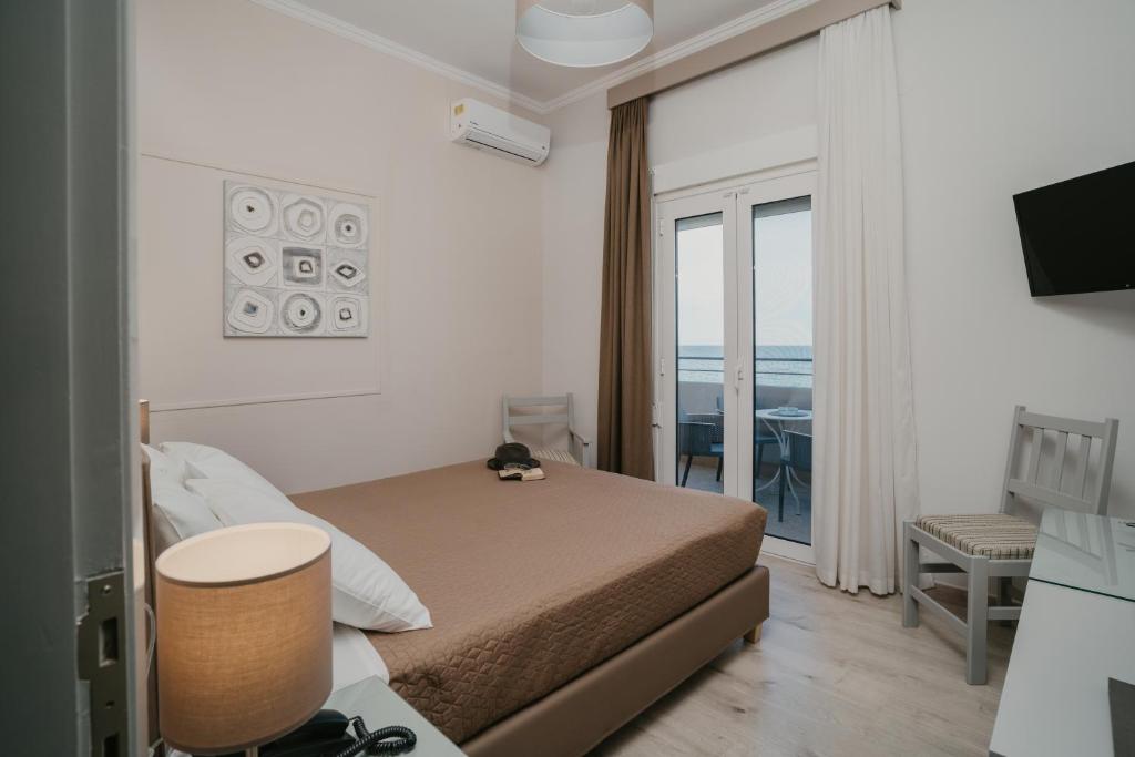 TV a/nebo společenská místnost v ubytování Hotel Alkyon