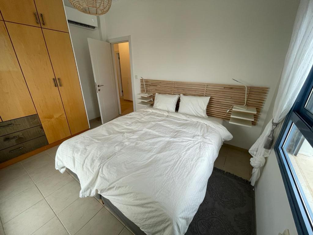 Postel nebo postele na pokoji v ubytování Kalimera View