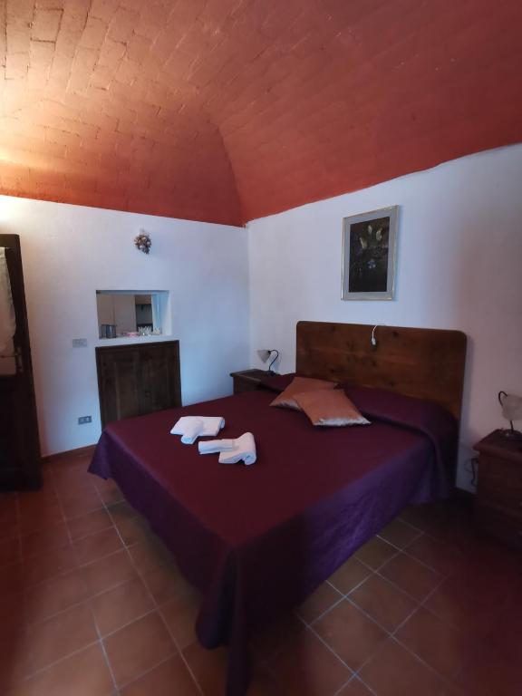 Postel nebo postele na pokoji v ubytování Casa MAMMUCCIA