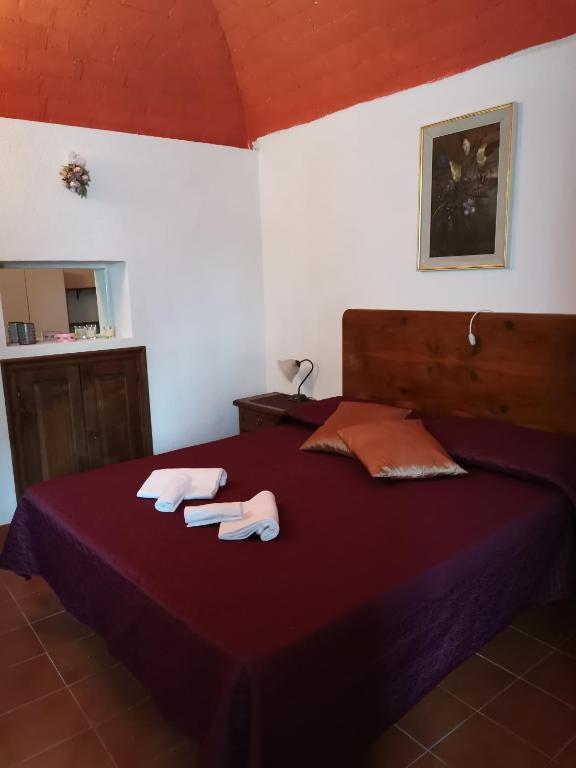 Postel nebo postele na pokoji v ubytování Casa MAMMUCCIA