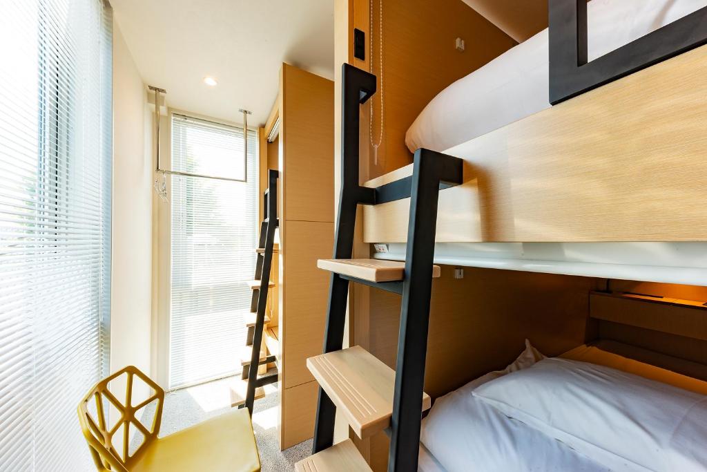 Postel nebo postele na pokoji v ubytování plat hostel keikyu kamakura wave